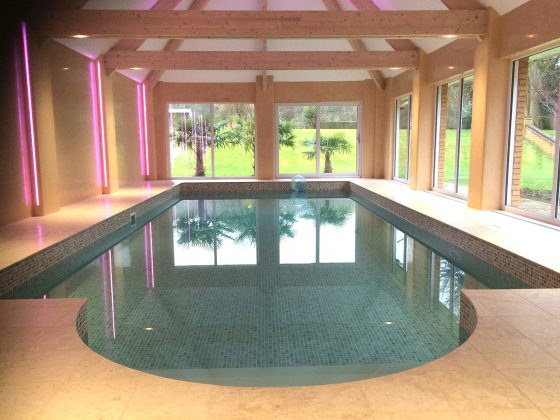 Travertine Roman end on indoor pool