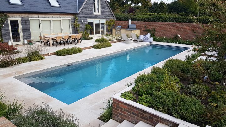 Fossil pearl satin pool surround with Bridport porcelain pool floor ...