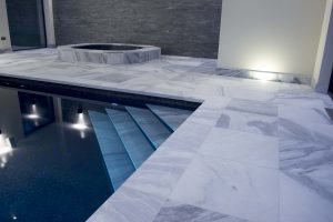 Indoor Pool with Pembury Marble surround and overlip copings.