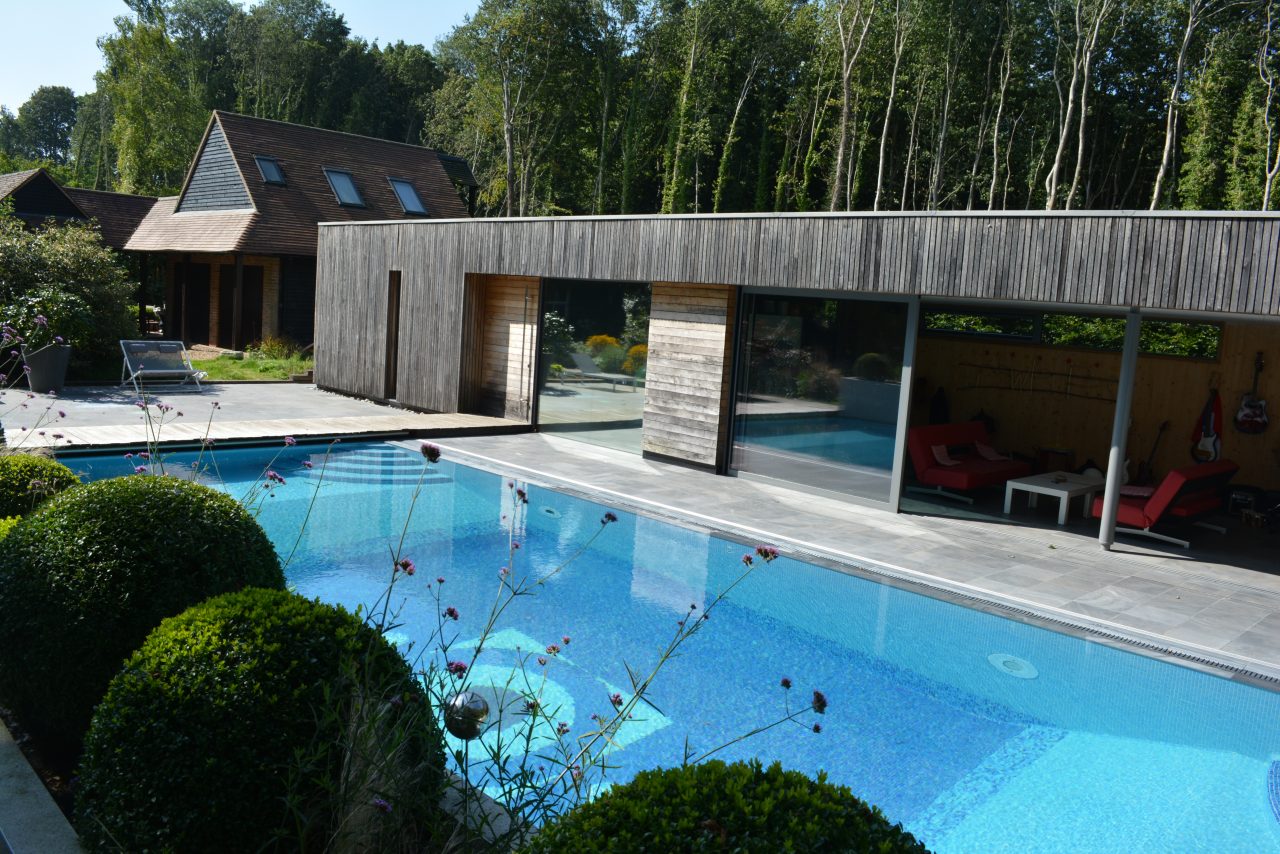 Grey limestone swimming pool surround by cranbourne stone ltd
