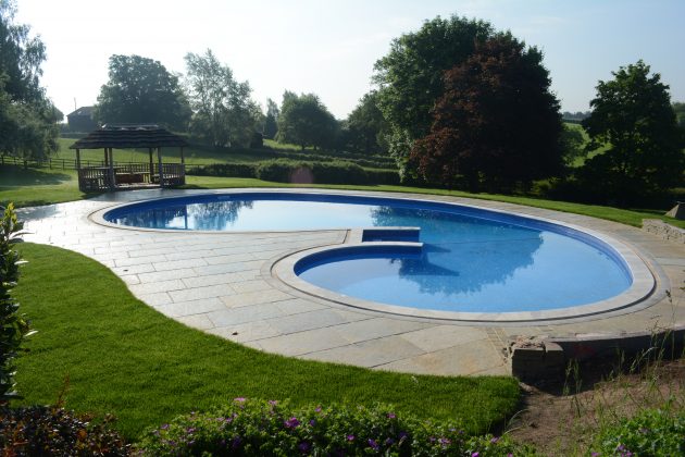 made to measure pool copings and contrasting border in free form shape pool copings by cranbourne stone ltd